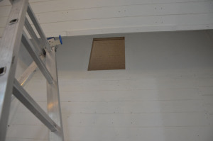 hole in back of Swell box for accessing Waldhorn pipe resonators for regulation