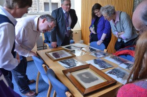 We examine the records on display