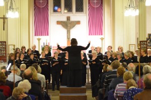Victoria Ely conducts the ladies of MK Chorale