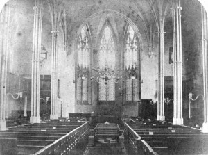 Interior of St Giles Church, Stony Stratford, about 1850. At this time the first organ (built by H.C. Lincoln in 1824) was in the West End and the plain dark panelled side galleries extended round the East end corners of the church.