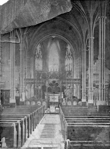 Interior of St Giles Church, Stony Stratford, either 1877 or 1890. At this time the organ was in the East End on the right (South) and the side galleries no longer extended round the East end corners. The first (very elaborate) choir screen was installed in 1877. The organ pipes were decorated. According to the National Pipe Organ Register the John Stringer organ was not installed until c1890, so was this the first organ by H.C. Lincoln or was this photo taken in 1890?