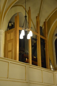 The casework for the Great and Choir side, including top finials, in place awaiting pipes