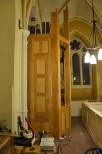 Side view of the Great & Choir casework, with the panels fitted. Awaiting front pipes.