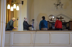 Jonathan does a piece to camera at the Willis console