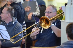 Martin Wakley and his trombone in rehearsal