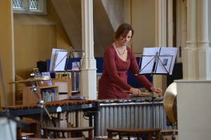 Liz Lane playing percussion for Antiphonary