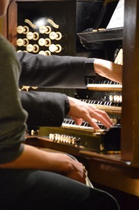 Paul's fingers worked hard playing the Willis pipe organ