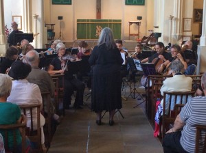Lesley conducts the band