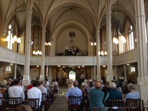 Audience listens to Shanna playing the Willis organ