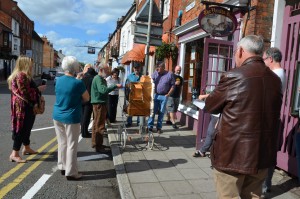 Playing the street organ to Vaults bar folk