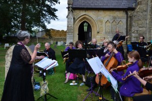 Lesley conducts the band