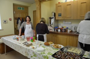 Cheerfully leading the refreshment team