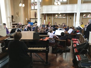 Mrs Noon plays with the school orchestra