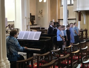 SMSG school choir with Mrs Noon at the piano