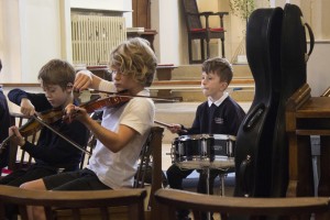 Young string and percussion players