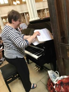 Mrs Noon sorting her music