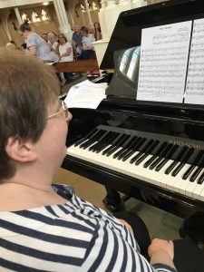 Mrs Noon at the piano