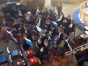 SMSG school orchestra with the band