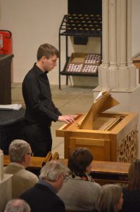 Alex Aitken at the chamber organ