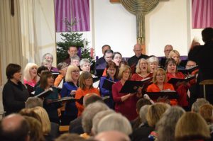 MK Chorale singing at Christmas
