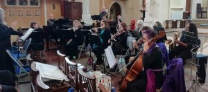 Conducting and playing